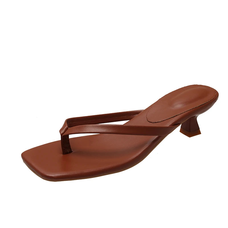 Mules con tacco basso e listino Eulalie