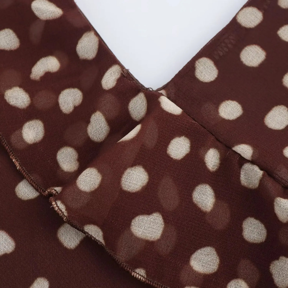 Ärmelloses langes Kleid mit Punkten Mahaut