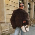 Manteau en fausse fourrure bouclée Bérénice